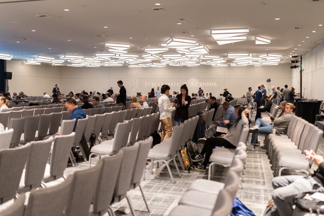 Large technology conference with audience and stage